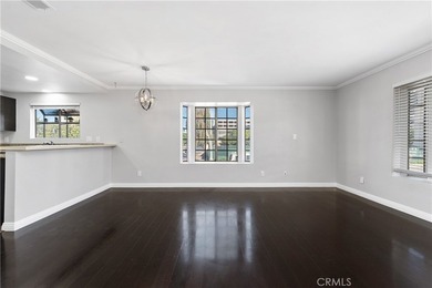 This two-story, townhouse-style condominium offers two primary - photo 5