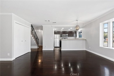 This two-story, townhouse-style condominium offers two primary - photo 6