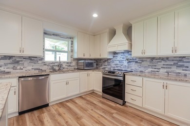 Welcome home to this charming four-bedroom, 2.5-bath beauty in - photo 10