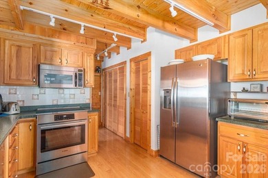 This warm and inviting, solidly built custom log home is - photo 11