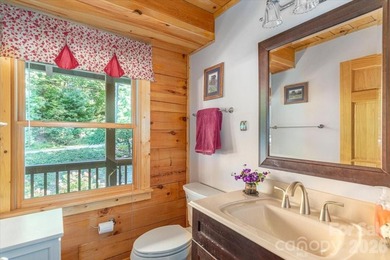 This warm and inviting, solidly built custom log home is - photo 12