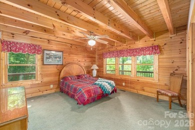 This warm and inviting, solidly built custom log home is - photo 13
