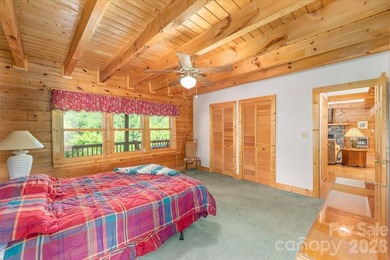 This warm and inviting, solidly built custom log home is - photo 14