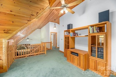 This warm and inviting, solidly built custom log home is - photo 19