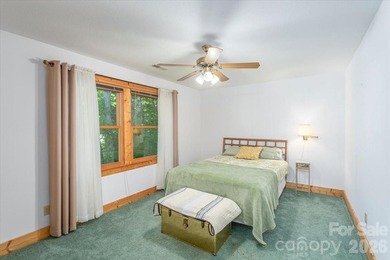 This warm and inviting, solidly built custom log home is - photo 20