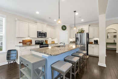 Welcome to this charming Charleston-style home in the highly - photo 1