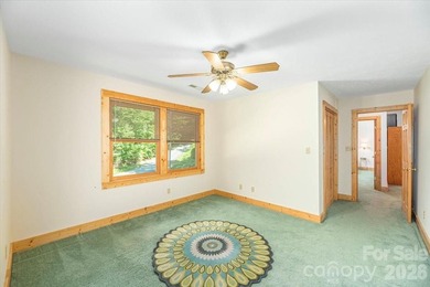 This warm and inviting, solidly built custom log home is - photo 22