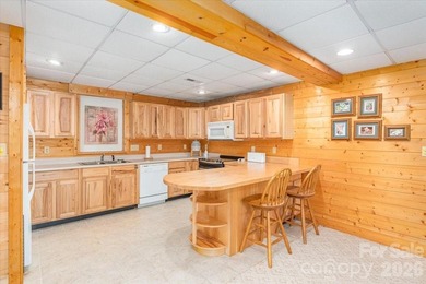 This warm and inviting, solidly built custom log home is - photo 26