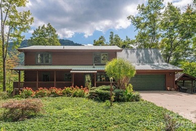 This warm and inviting, solidly built custom log home is - photo 36