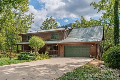 This warm and inviting, solidly built custom log home is - photo 41