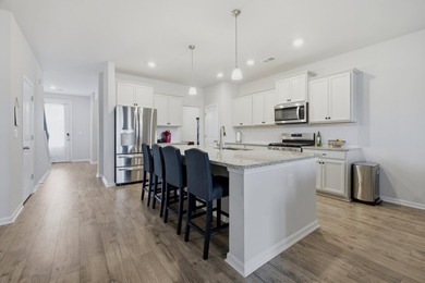 Come and see this beautiful Tillman model overlooking the pond - photo 9