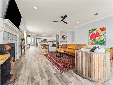 Tucked away in the centrally-located gated community of - photo 1
