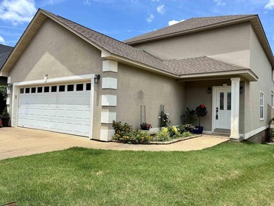 Tucked away in the centrally-located gated community of - photo 2