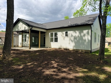 Nestled in the prestigious Lake of the Woods community, this - photo 3