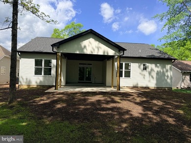 Nestled in the prestigious Lake of the Woods community, this - photo 5