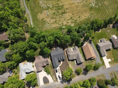Nestled in the prestigious Lake of the Woods community, this - photo 8