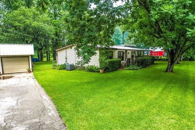 Welcome to this beautifully maintained waterfront property - photo 1