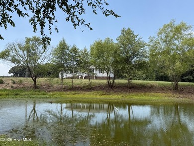 The 10.39 property has 2 houses and a private pond on it - photo 25