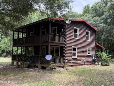The 10.39 property has 2 houses and a private pond on it - photo 31