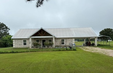 This home has 3 bedrooms and 2 bathrooms, the split-bedroom - photo 1