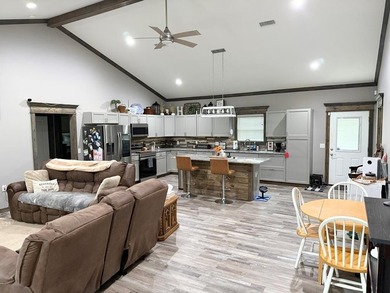 This home has 3 bedrooms and 2 bathrooms, the split-bedroom - photo 9