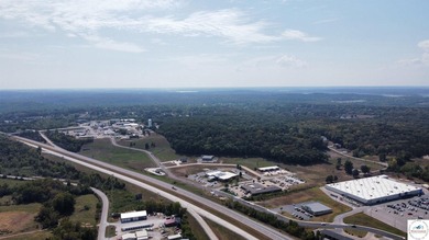Commercial building and large tract located at the corner of 65 - photo 15