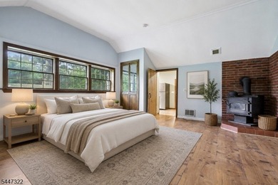 Storybook charm! This inviting two-bedroom cottage sits - photo 22