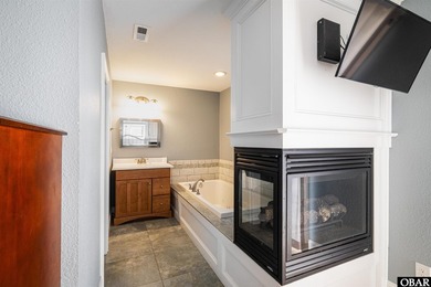 Experience the best of Corolla living in this stunning - photo 31