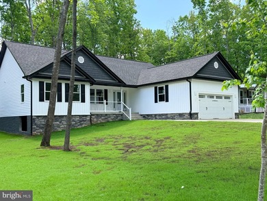 Nestled in the prestigious Lake of the Woods community, this - photo 3