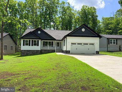 Nestled in the prestigious Lake of the Woods community, this - photo 4