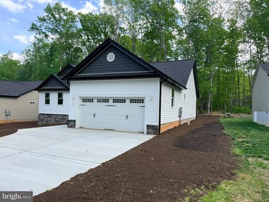 Nestled in the prestigious Lake of the Woods community, this - photo 9