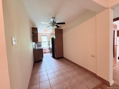 Welcome to this bright and inviting two-bedroom co-op apartment - photo 2