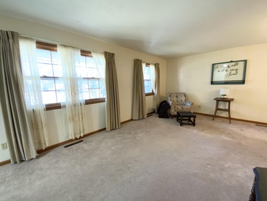 Location, location, location! This all one level home with 4