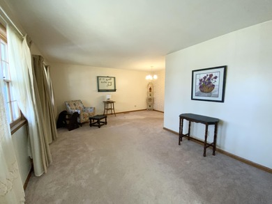 Location, location, location! This all one level home with 4