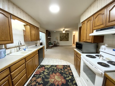 Location, location, location! This all one level home with 4