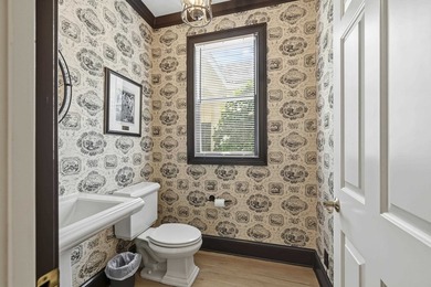 Nestled within the coveted Parkside enclave of Cuscowilla on - photo 12