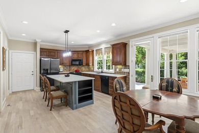 Nestled within the coveted Parkside enclave of Cuscowilla on - photo 17