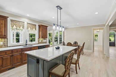 Nestled within the coveted Parkside enclave of Cuscowilla on - photo 18