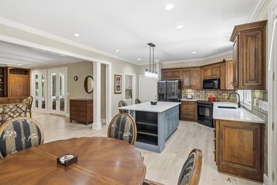 Nestled within the coveted Parkside enclave of Cuscowilla on - photo 19