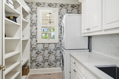 Nestled within the coveted Parkside enclave of Cuscowilla on - photo 21