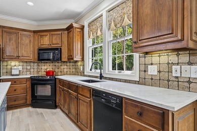 Nestled within the coveted Parkside enclave of Cuscowilla on - photo 24