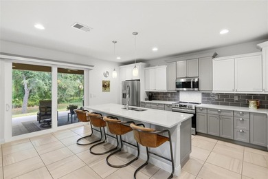This exceptional 2020-built modern Florida residence offers a - photo 15