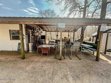 4 bedroom, 1 bath home with a huge covered area perfect for - photo 16