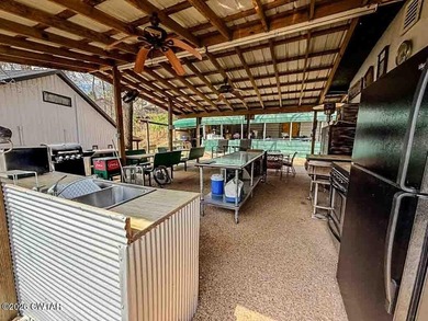 4 bedroom, 1 bath home with a huge covered area perfect for - photo 17