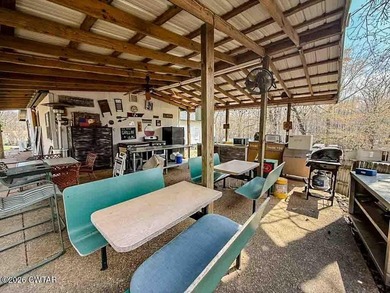4 bedroom, 1 bath home with a huge covered area perfect for - photo 18