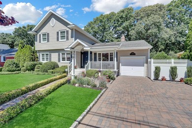 Welcome to this beautifully expanded ranch nestled in one of the - photo 3