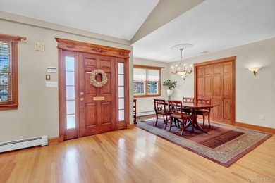 Welcome to this beautifully expanded ranch nestled in one of the - photo 4