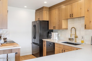 Unobstructed views of the Arrowhead ski slopes highlight this - photo 8