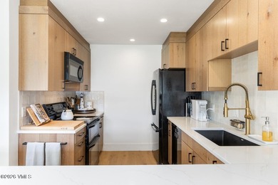 Unobstructed views of the Arrowhead ski slopes highlight this - photo 9