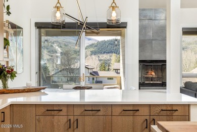 Unobstructed views of the Arrowhead ski slopes highlight this - photo 10